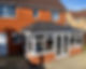 A brick house with an extension