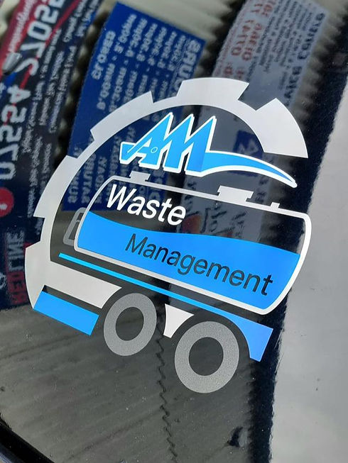 A blue and white "AM Waste Management" logo sticker
