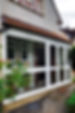 A porch with white uPVC windows