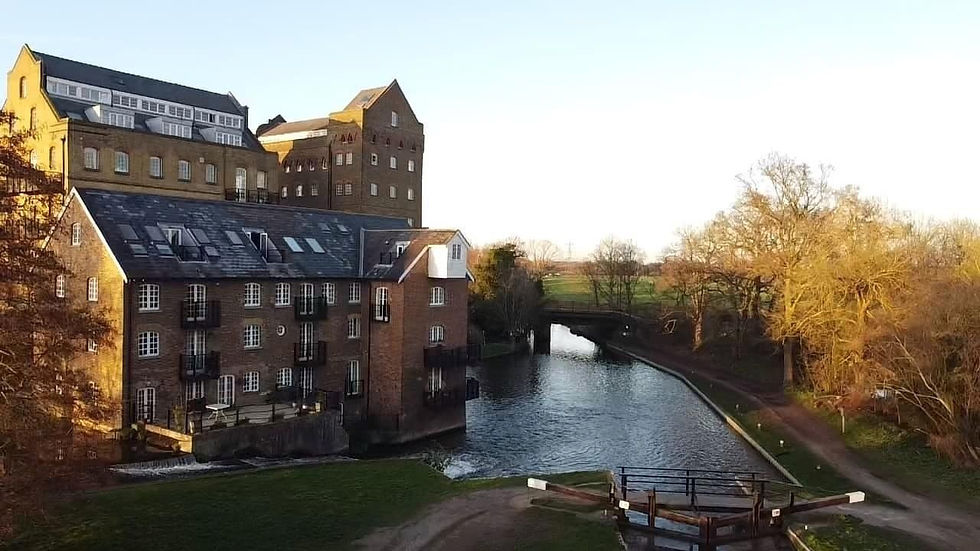  Large mill conversion alongside a river in the English countryside