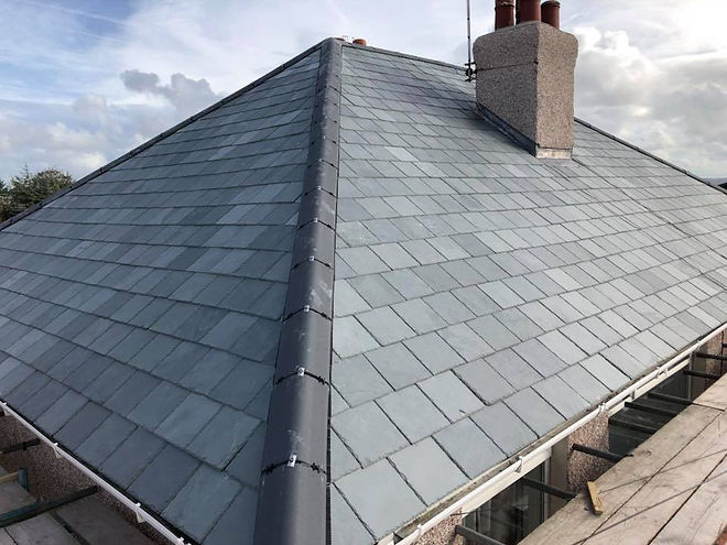 A well-constructed slate roof with grey tiles