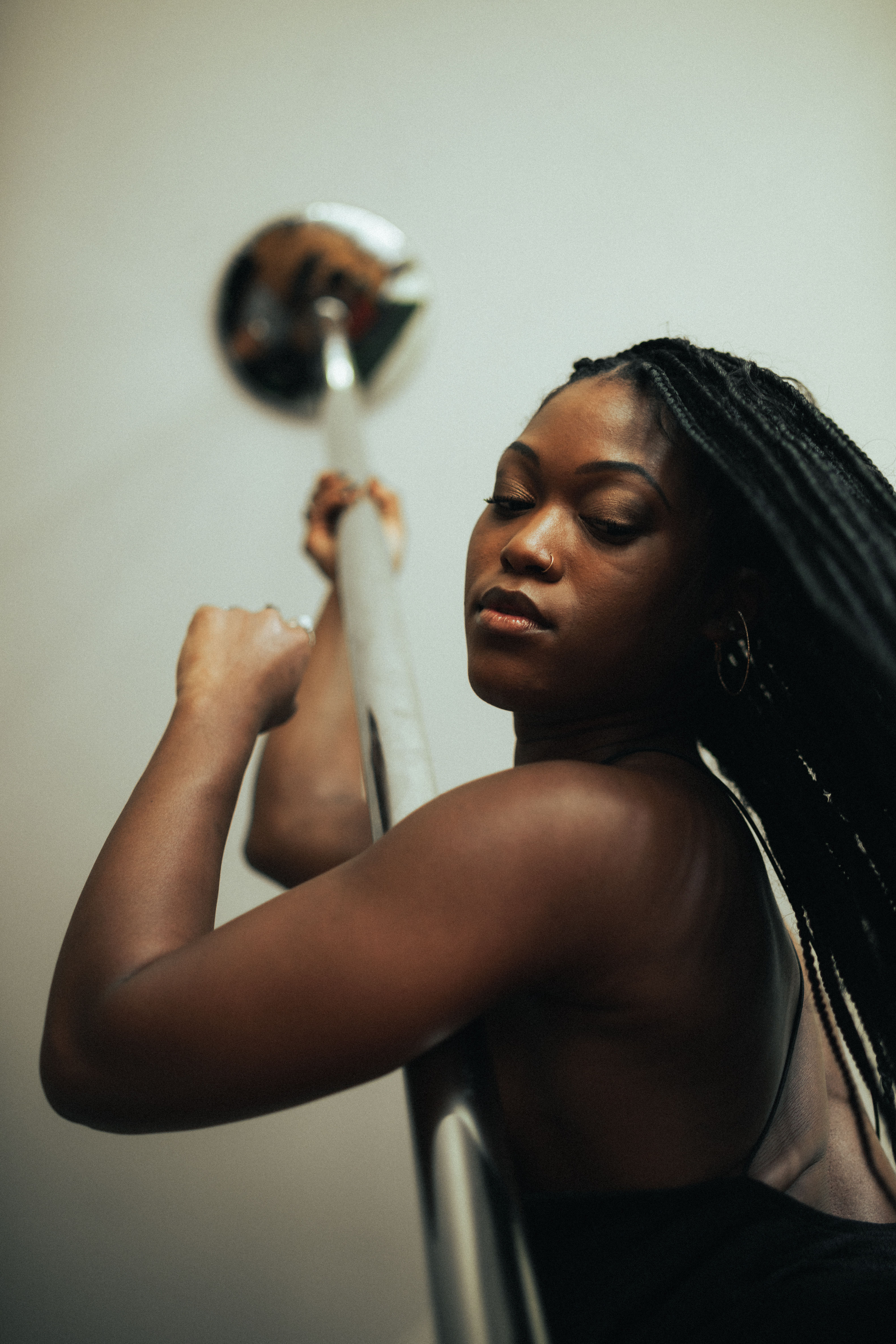 Abundant Healing Wellness creator, Brittney, in her pole studio.