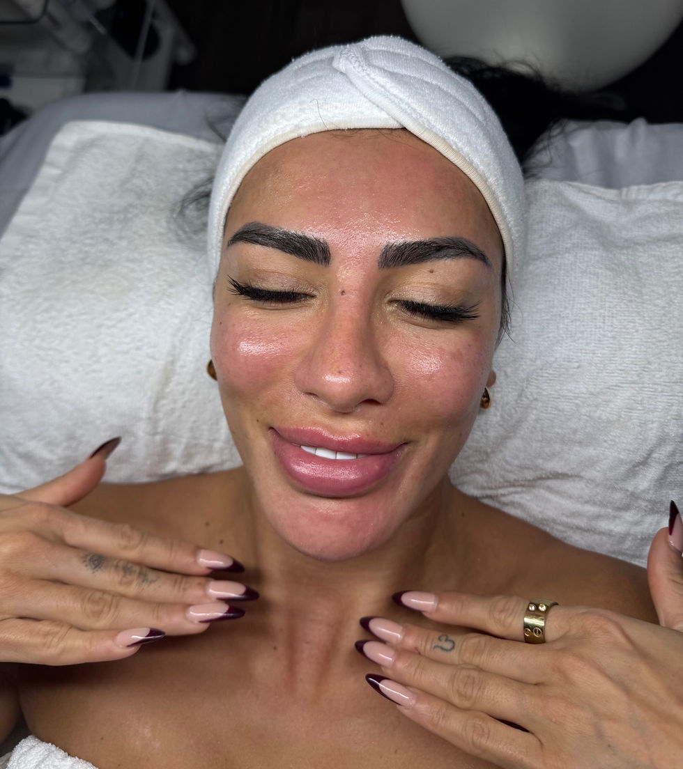 happy woman after getting a facial done