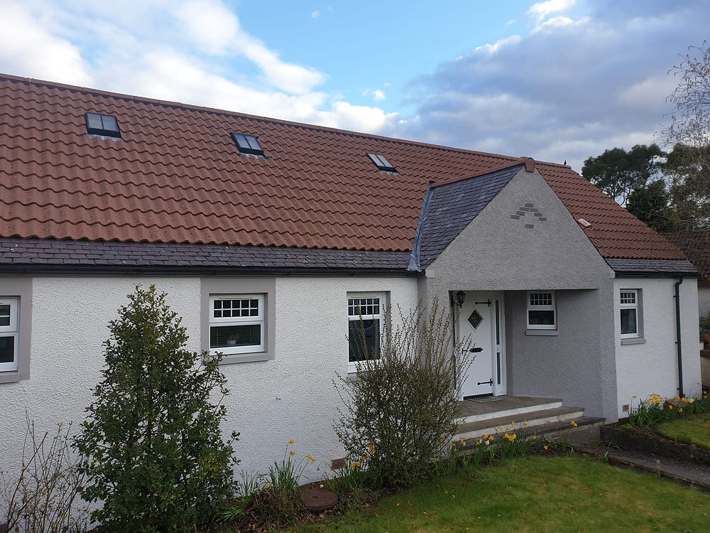 After picture of house freshly painted and roof cleaned, Fife. Roof Cleaned and house painted by Altitude Scotland