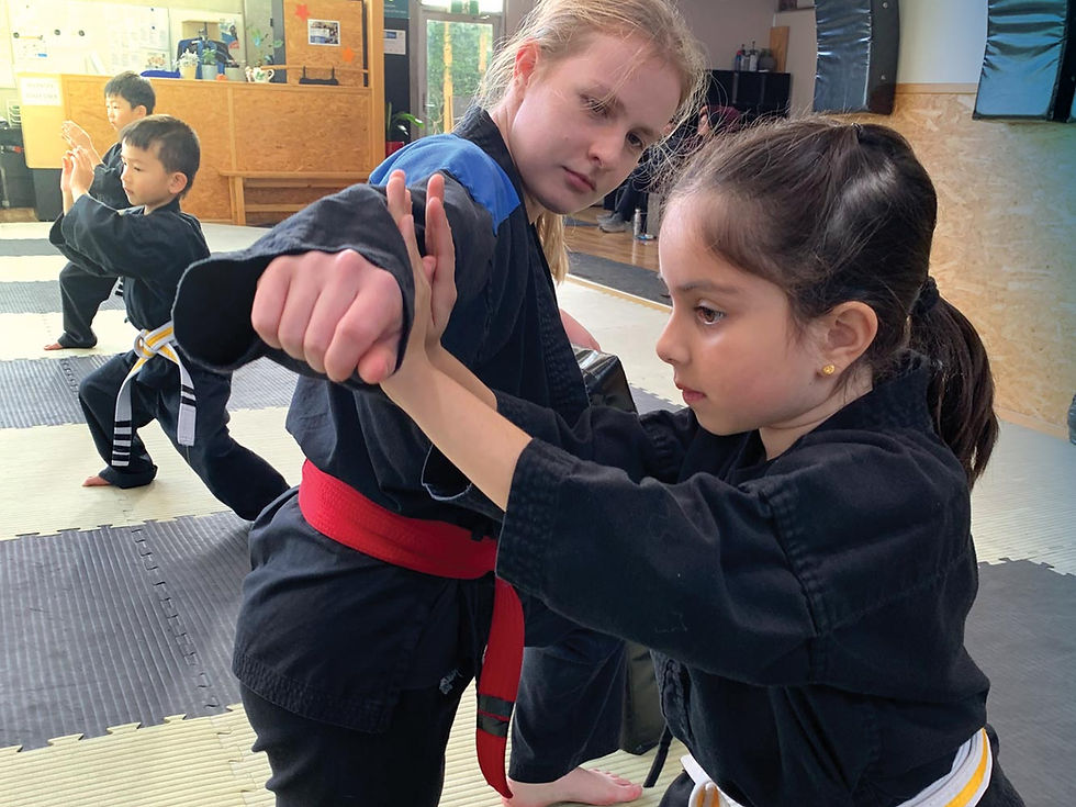 Young student at her first belt grading