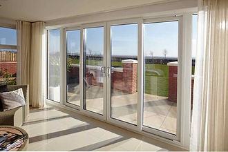 Patio Sliding French Bi-Folding Doors Aluminium Modern Contemporay Folding door tri-folding burgess hill haywards heath sussex FENSA