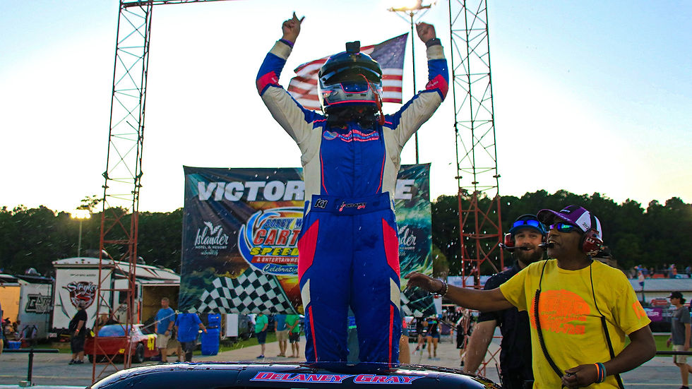 Delaney Gray celebrates after winning the Davey Allison Memorial at Bobby Watson's Carteret County Speedway. (Andy Marquis photo)