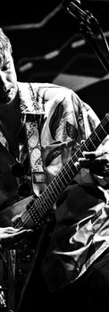 Guitarist Benedict Mann from British jam band Big Sky Orchestra playing a gig at Sonic Rock Solstice Festival UK