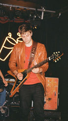 Guitarist Benedict Mann from British jam band Big Sky Orchestra playing a gig at Worcester Music Festival UK