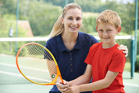 Boy with Tennis Coach