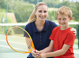 Boy with Tennis Coach