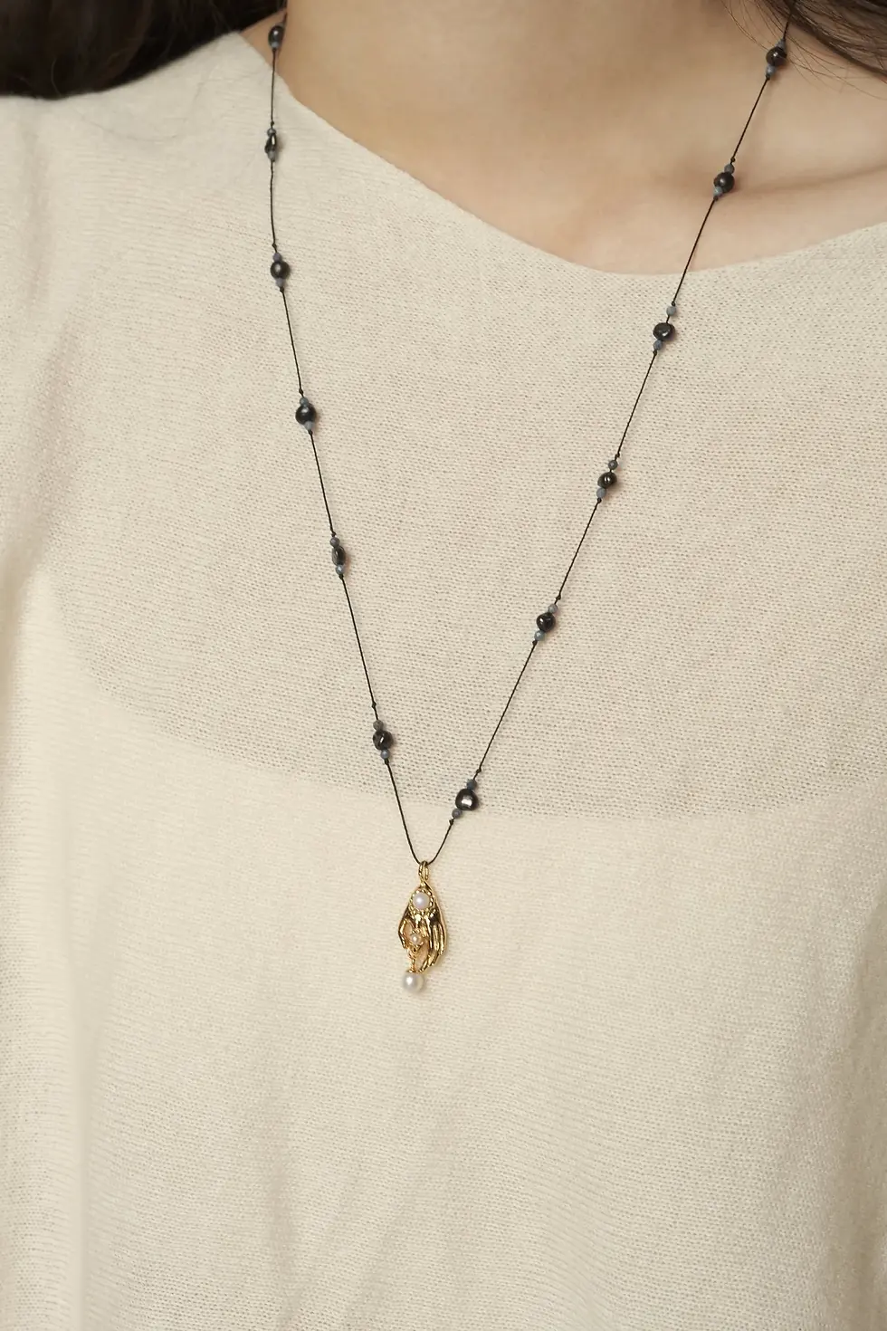 Thumbnail: HAND & PEARL BRAIDED NECKLACE