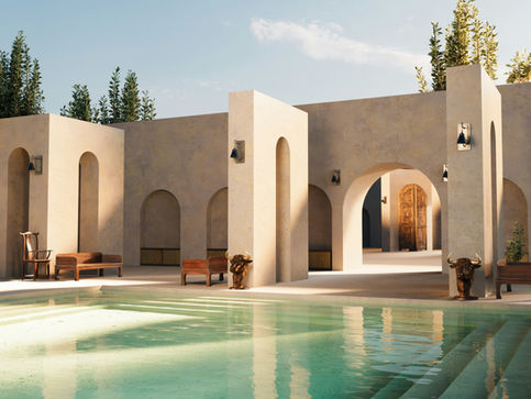 Arched limestone villa courtyard and pool with integrated exterior lighting