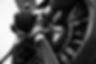 close up on a radial engine and propeller of a bi plane in black and white. The spinner an