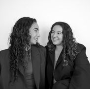 Photographers capturing bride and groom during golden hour in Buckinghamshire.