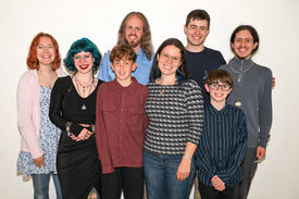 Professional studio family photography capturing genuine smiles and timeless family memories.