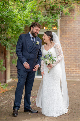 Natural wedding photography capturing the happy couple just moments after saying their vows in Maidenhead.