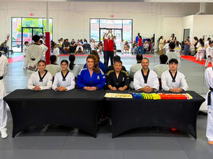 Grand Master Song and the Team One Taekwondo coaching panel at a belt testing event in McAllen, TX