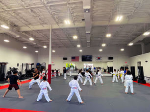 Kids training together during a Team One Taekwondo group class in McAllen, TX