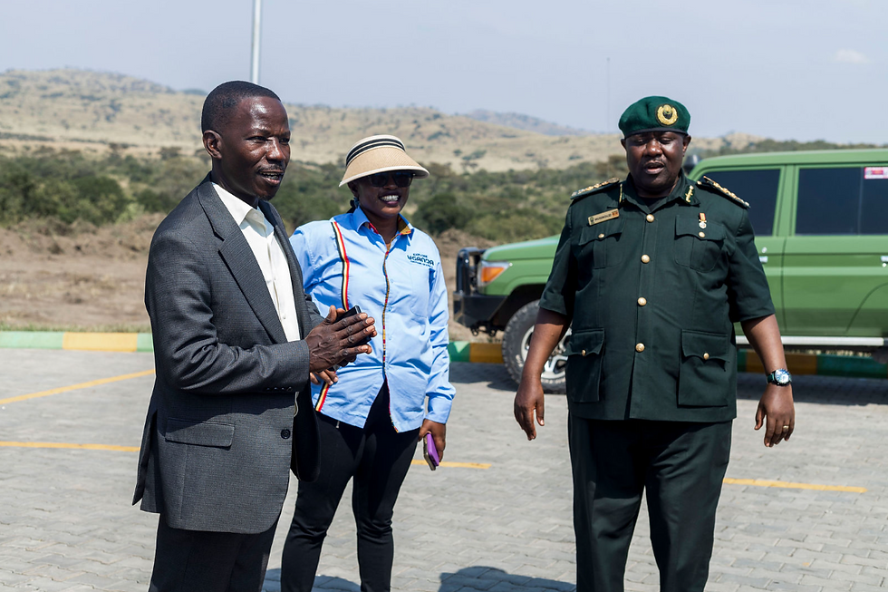 (Left) Under Secretary, Mr. Geoffrey Sseremba, (Center) Dr. Jackie Nyiracyiza Besigye & (Right) Dr. James Musinguzi