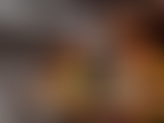 Rudrabhishek puja with Shiva Lingam being bathed with milk, surrounded by flowers, fruits, and sacred offerings.