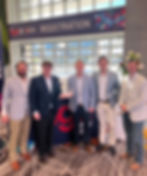 Five men, 4 representing Corner Market and 1 representing Hunt, proudly smile with Corner Market's NGA Creative Choice Award.