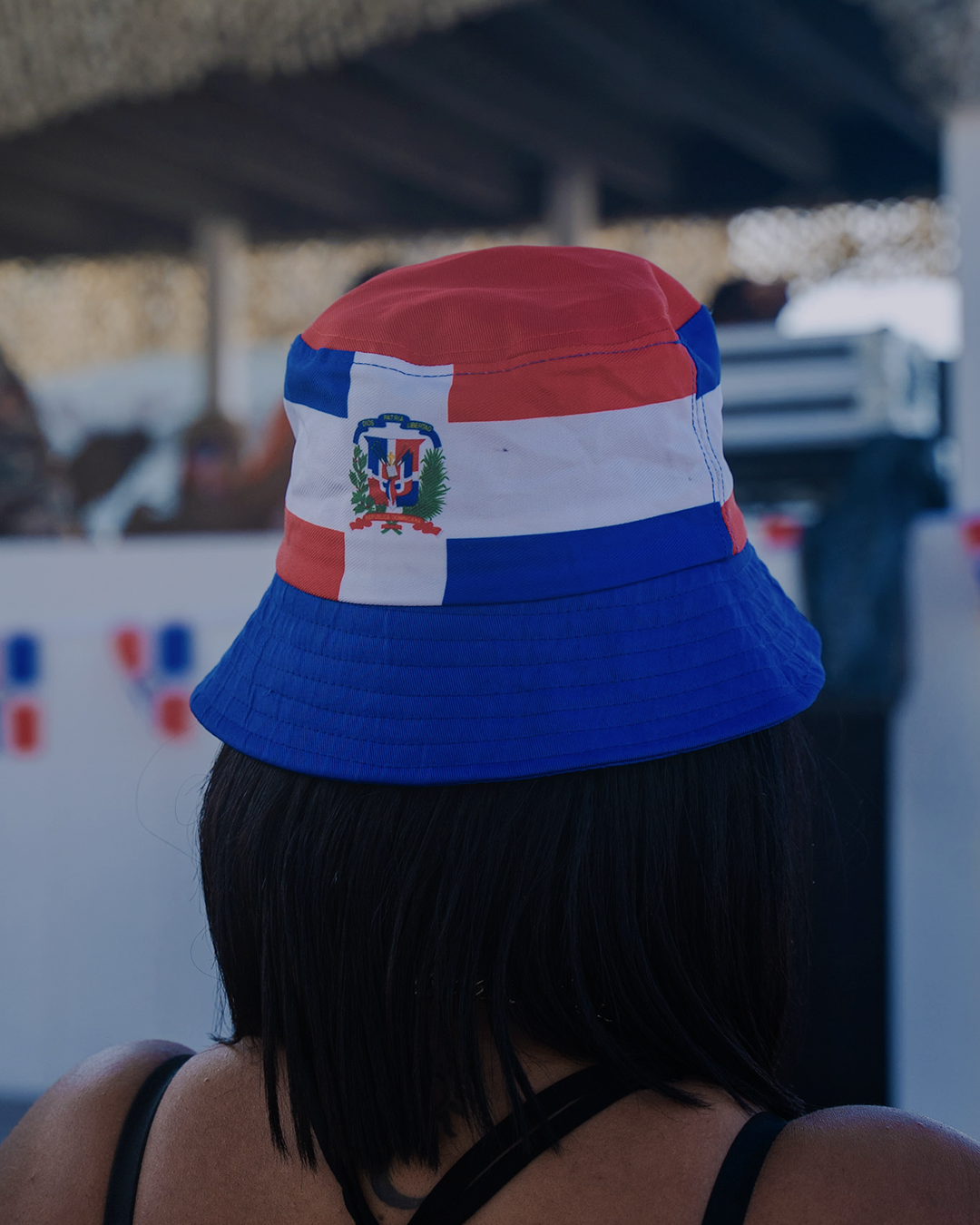 Dominican flag bucket hat at Dembow Con Mangú