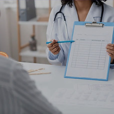 consultant doctor offering plan to patient