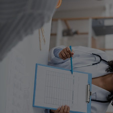 consultant doctor offering plan to patient
