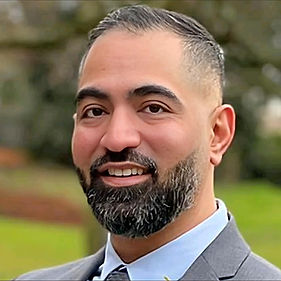 Headshot of Dr Malik