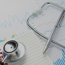doctor's stethoscope, pen and notepad