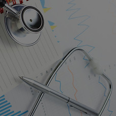 doctor's stethoscope, pen and notepad