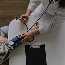 consultant doctor running test on patient