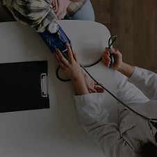 consultant doctor running test on patient