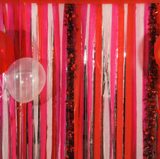 balloons and crepe backdrop