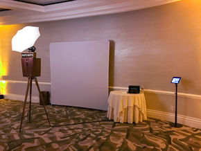 ballroom set up with white backdrop