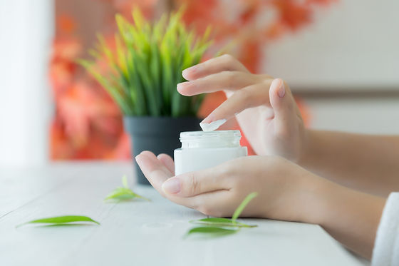 woman-holds-jar-with-cosmetic-cream-her-hands.jpg
