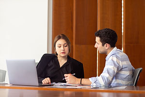 front-view-young-attractive-businesswoman-black-shirt-black-jacket-along-with-young-man-di