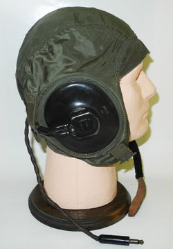 Late WWII USN USMC AN6540 series flying helmet in green nylon with ANB-H-1A receivers and cord