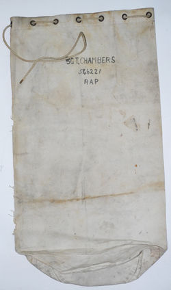 RAF white canvas kit bag with rope tie and locking device. 1940 dated Air Ministry marked