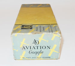 US 1930s American Optical "Airway" goggles with dark tinted lenses, in aluminium tin and storage box