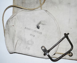 RAF white canvas kit bag with rope tie and locking device. 1940 dated Air Ministry marked