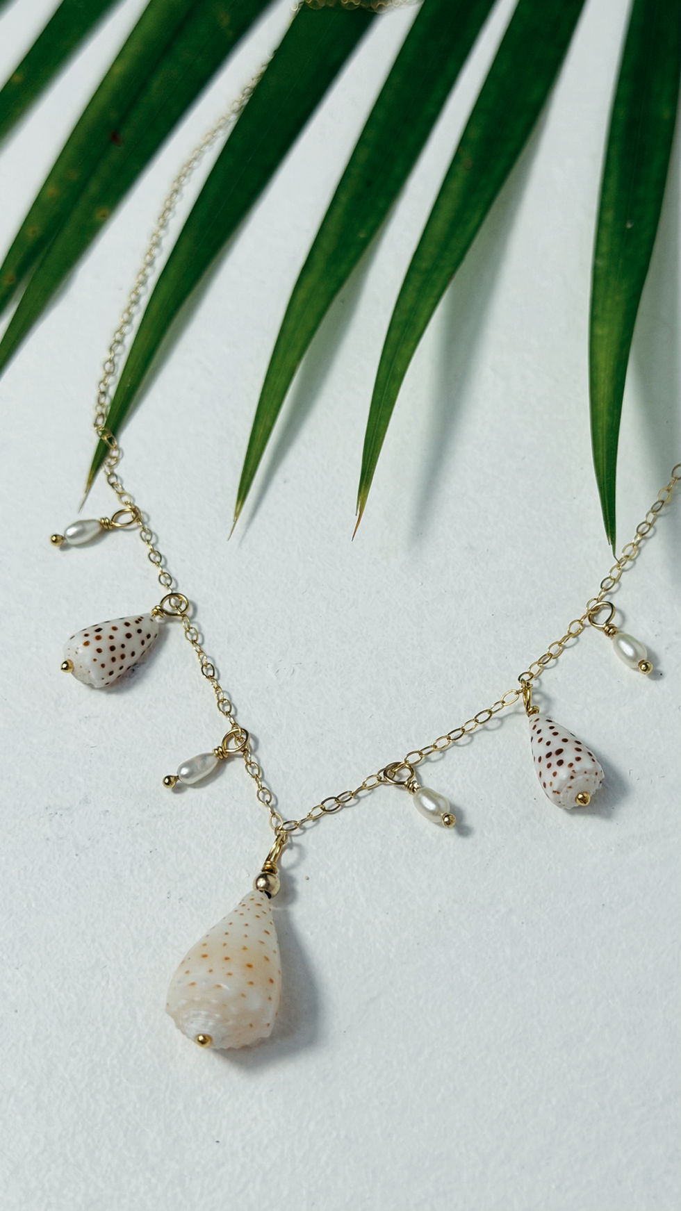 Thumbnail: Cone Shell & Pearl Charm Necklace Gold Filled