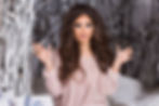 cute-woman-with-suprice-face-big-pink-knitted-sweater-posing-decorated-studio-winter-fores