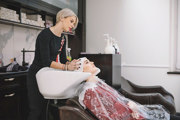hairdresser-finishing-head-washing-sink.jpg