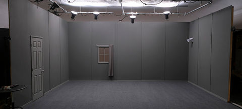 Set build in white cyc wall studio