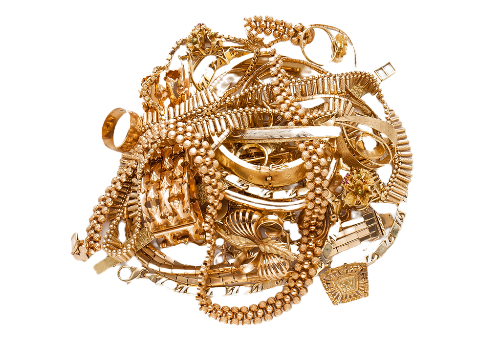 Tangled pile of scrap gold jewellery including chains, rings, and bracelets