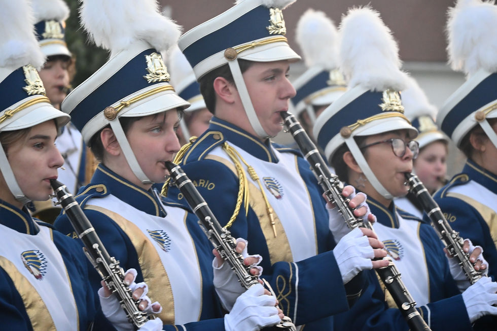 Eye-level view of a high school band performing at a community event