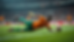 Eye-level view of a goalkeeper making a diving save during a World Cup match