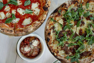 Casual pizza restaurant adds a free Classic Cheese Pizza to orders of any pie from its menu Wednesda